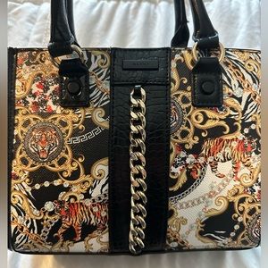 New with tags never used very cuts Aldo bag
